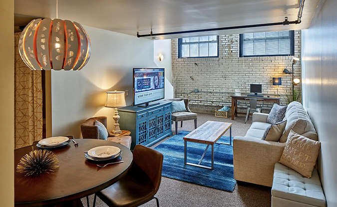 Image Of A Living Room And Dining Area At City Lofts on Laclede